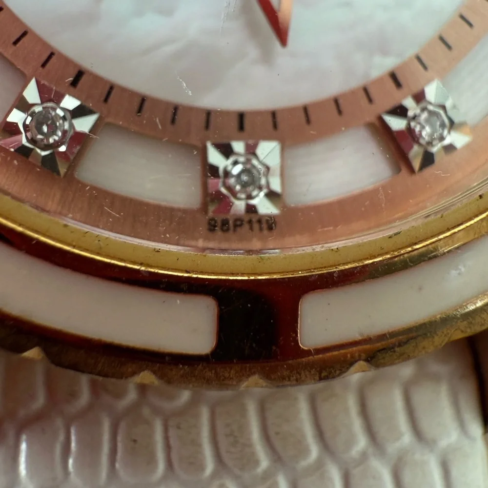 Bulova ladies 98P119 rose gold tone white leather watch NEW BATTERY